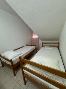 Posteľ alebo postele v izbe v ubytovaní Villa Nada