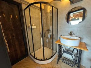 a bathroom with a shower and a sink at Apartmán u Ondrika in Spišské Tomášovce +45 photos