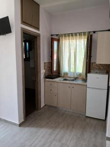 Kuchyň nebo kuchyňský kout v ubytování Vassilis Studios