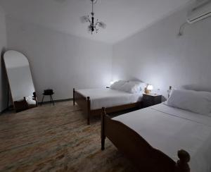 Postel nebo postele na pokoji v ubytování The Stone Arch Inn