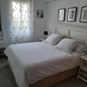 Postel nebo postele na pokoji v ubytování "EL RINCON" naturist boutique apartment