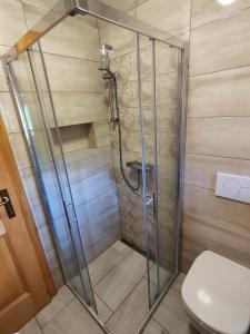 Koupelna v ubytování Počitniška hišica Rogatec - Holiday Cottage Rogatec + 16 fotografií