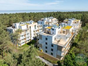 an aerial view of a building at Dąbki Beachfront Retreat in Dąbki