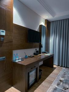 Телевизор и/или развлекательный центр в ClubHotel 777