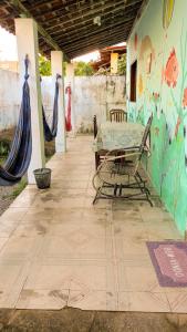 Uma varanda ou outra área externa em Caminhos do Mar Hostel