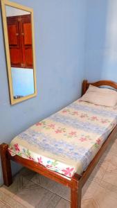 Cama ou camas em um quarto em Caminhos do Mar Hostel