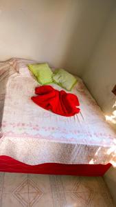 Cama ou camas em um quarto em Caminhos do Mar Hostel