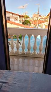 Uma varanda ou terraço em Caminhos do Mar Hostel