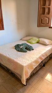 Cama ou camas em um quarto em Caminhos do Mar Hostel
