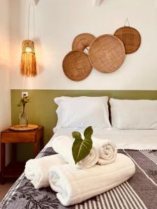 Ένα ή περισσότερα κρεβάτια σε δωμάτιο στο Pousada Jardim da Praça