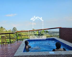 Πισίνα στο ή κοντά στο Villa el Eden Cabañas