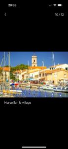 a picture of a marina with boats in the water at Maison les pieds dans L'eau à 150 m de la plage in Marseillan +7 photos