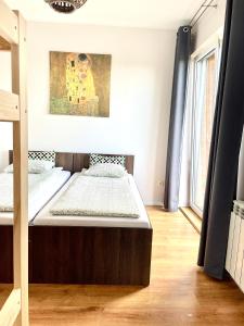 Postel nebo postele na pokoji v ubytování Sonja + 9 fotografií