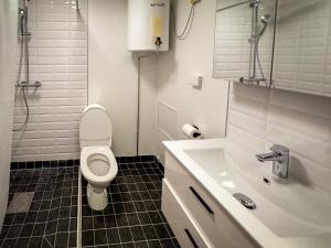 Koupelna v ubytování Jönköping Hotel Apartments + 23 fotografií
