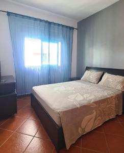 Postel nebo postele na pokoji v ubytování Ouedlaou, Residence AL FAJR + 12 fotografií