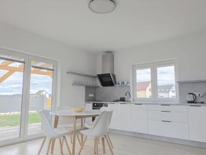 Kuchyň nebo kuchyňský kout v ubytování Apartman Amanda - Ohrada + 1 fotografie