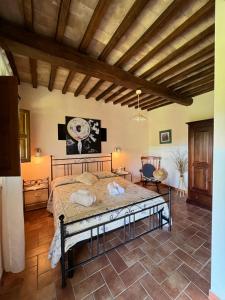 Postel nebo postele na pokoji v ubytování Agriturismo Melodie Toscane Sorano