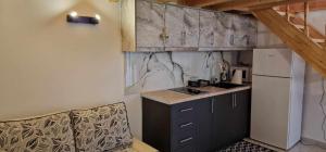 Η κουζίνα ή μικρή κουζίνα στο Filippos Home
