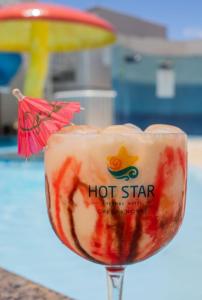 a close up of a hot star drink in a glass at Hot Star Thermas Hotel in Caldas Novas
