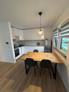 Η κουζίνα ή μικρή κουζίνα στο ID Apartmenthaus