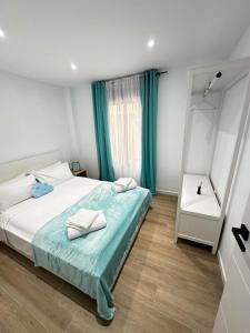 Postel nebo postele na pokoji v ubytování Sea Breeze Apartment