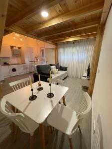 a living room with a table and two candles on it at Apartamento de la Luz in Tarifa