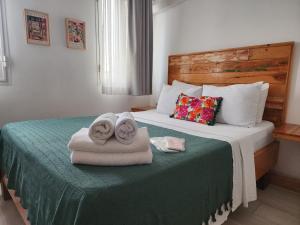 Postel nebo postele na pokoji v ubytování merih butik hotel
