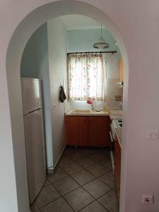 Kuchyňa alebo kuchynka v ubytovaní Athina Rooms