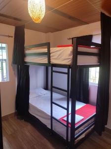 Postel nebo postele na pokoji v ubytování Maracuya Hostel