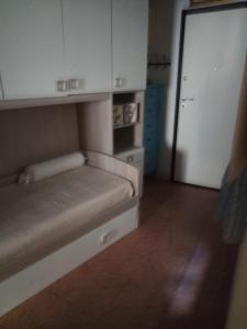 Postel nebo postele na pokoji v ubytování casa graziella