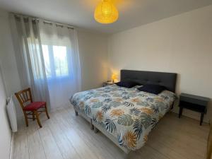 Posteľ alebo postele v izbe v ubytovaní Maison charmante à Concarneau avec spa extérieur