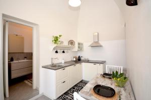 Η κουζίνα ή μικρή κουζίνα στο New modern loft by FM atelier