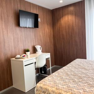 TV a/nebo společenská místnost v ubytování Gaivota Holidays
