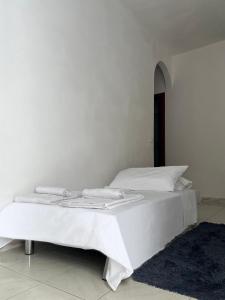 Postel nebo postele na pokoji v ubytování Taormina Seaside + 9 fotografií