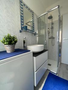 Ένα μπάνιο στο Casa Ferruccio - Parking - Air Conditioning - WiFi