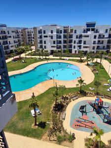 Bassein majutusasutuses Super appartement vue sur piscine et la plage või selle lähedal
