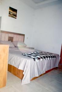 Voodi või voodid majutusasutuse Super appartement vue sur piscine et la plage toas