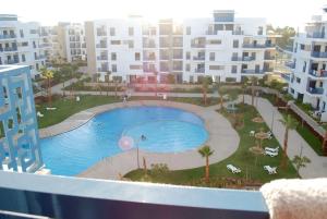 Bassein majutusasutuses Super appartement vue sur piscine et la plage või selle lähedal