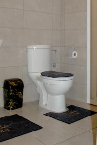 Vannituba majutusasutuses Super appartement vue sur piscine et la plage