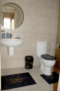 Vannituba majutusasutuses Super appartement vue sur piscine et la plage