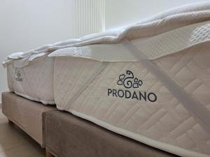 Postel nebo postele na pokoji v ubytování Prodano