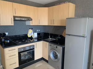 Appartement de luxe avec vue sur mer的厨房或小厨房