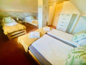 Postel nebo postele na pokoji v ubytování Dom Uzdrowisko