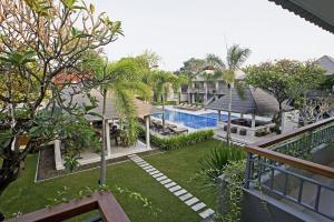 an aerial view of a resort with a swimming pool at Dewi Sri Hotel in Legian