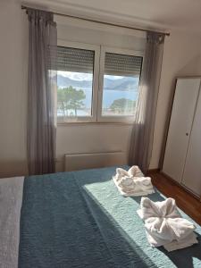 Una cama o camas en una habitación de Villa Nikola Kentera