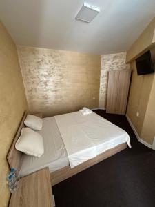 Postel nebo postele na pokoji v ubytování Complex Yavor