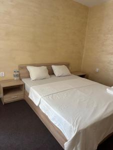Postel nebo postele na pokoji v ubytování Complex Yavor