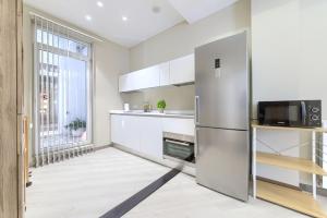 Кухня или мини-кухня в Abando Station Pintxos by Next Stop Bilbao
