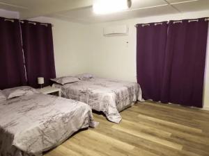 Postel nebo postele na pokoji v ubytování Unity House