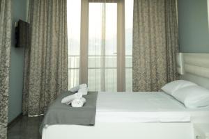 Postel nebo postele na pokoji v ubytování sea view rooms in Batumi